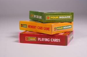Four Square playing cards on white background