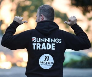 A man wearing a Bunnings Trade fundraising hoodie