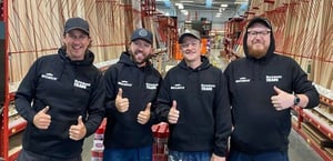 A group of men wearing Movember hoodies