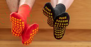 Red and black McDonalds football grip socksed and