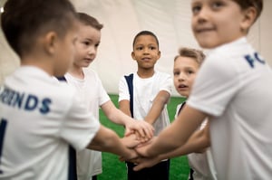 A group of young footballers team building