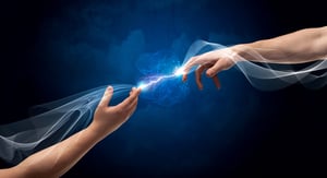 Two male arms reaching for each other, with a smoking electric current connecting their fingers in empty space background concept